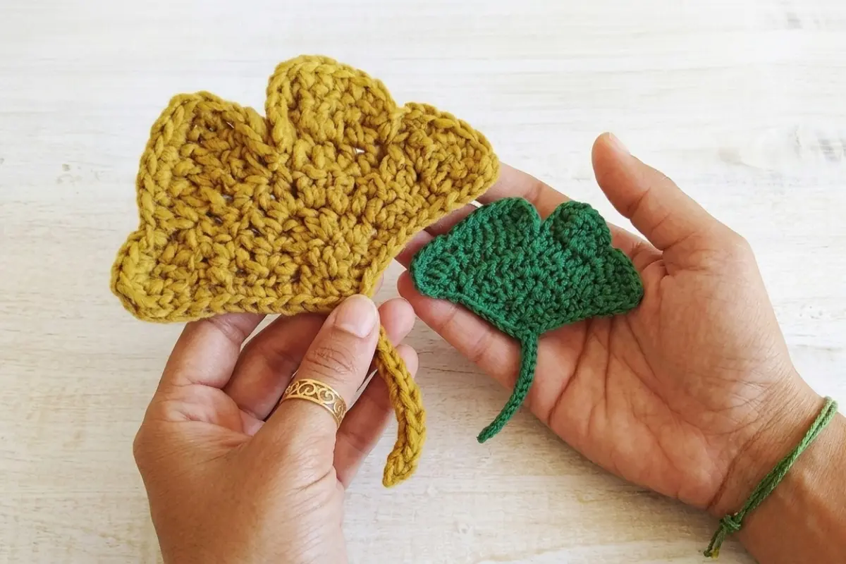 Crochet Ginkgo Leaf Pattern made with green DK cotton yarn and a crochet leaf stem