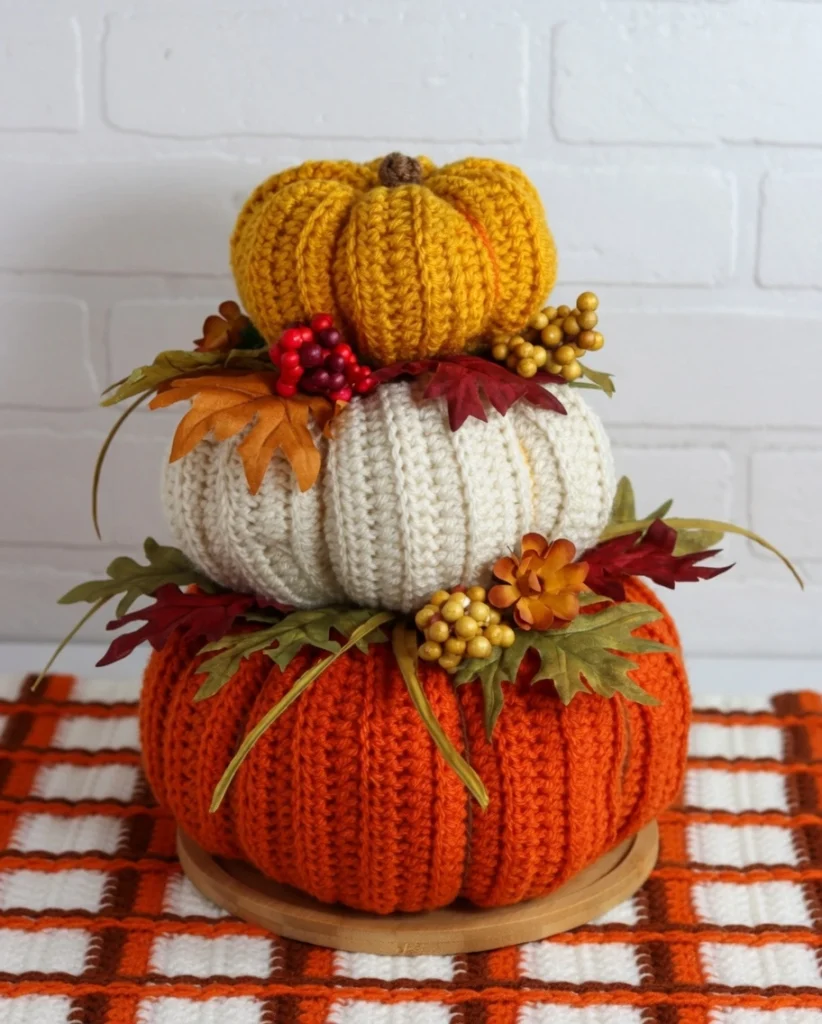Create a stunning farmhouse-style fall crochet centerpiece with this free pattern! Learn how to make easy stacked crochet pumpkins perfect for autumn decor.