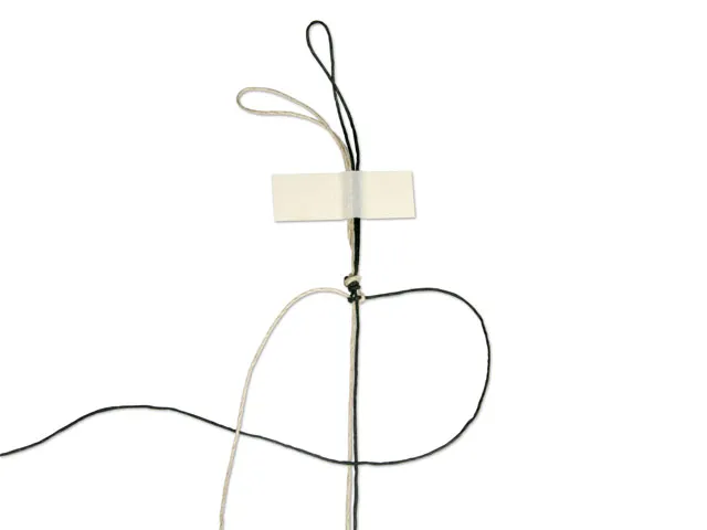 Step 6 crossing the right working cord over the center cords