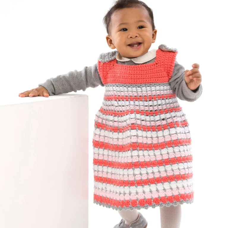 Artisan crochet baby jumper pattern for handcrafted baby clothing.