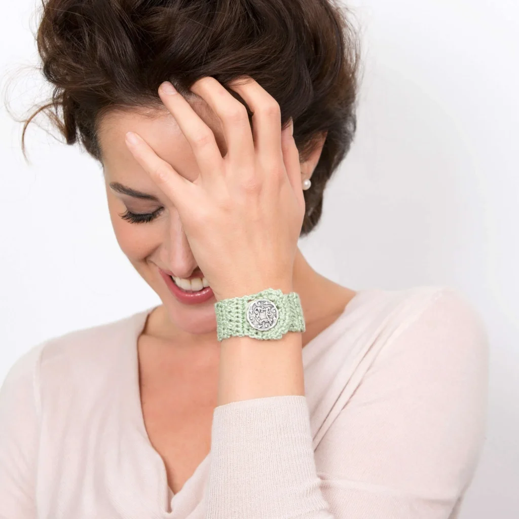 Button-Showcase Crochet Bracelet Pattern showcasing colorful designs and buttons.