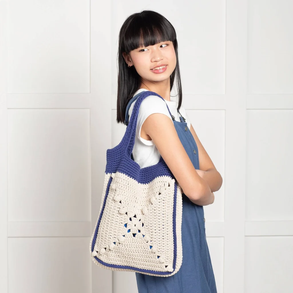 Colorful carry-on crochet tote bag pattern for stylish, practical storage