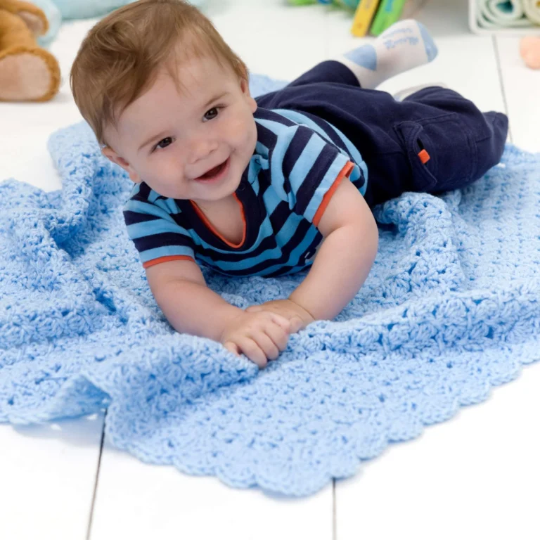 Cozy crochet baby blanket pattern in soft pastel colors