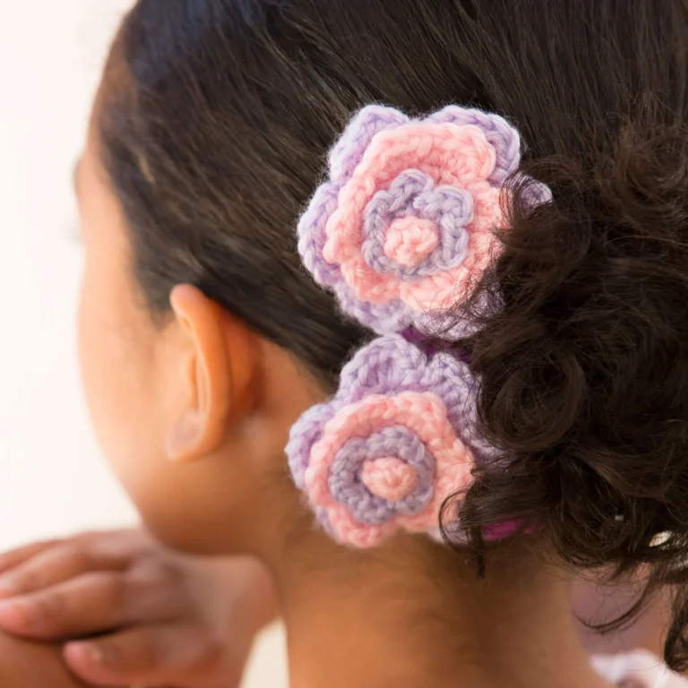 Crochet flower hair pattern showcasing vibrant and textured floral designs.