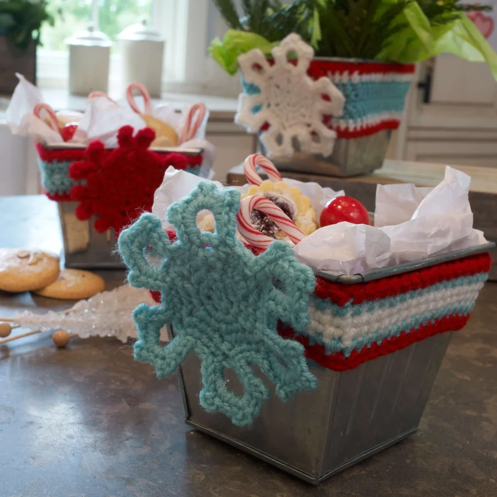 Crochet Holiday Wrapped Tins Pattern showcasing colorful, decorative tin designs.