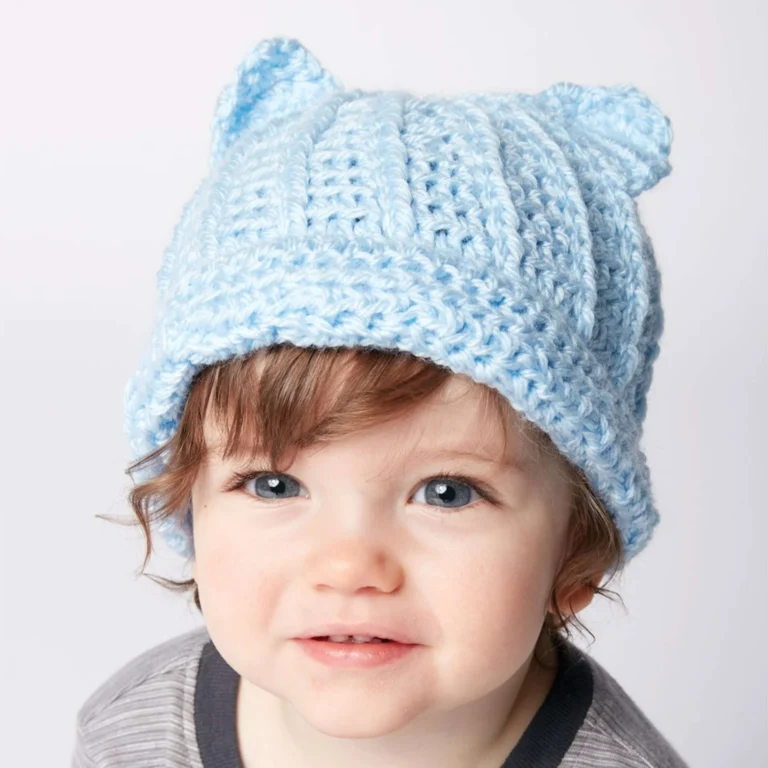 Crochet kitten hat pattern for babies, showcasing adorable design and warm materials.