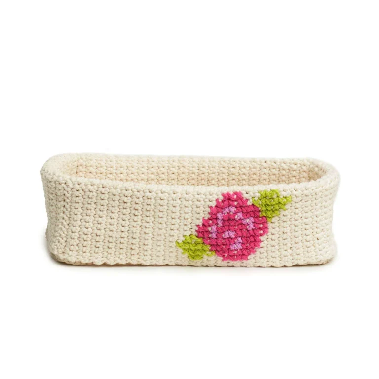 Cross-stitch crochet basket pattern demonstrating unique basket design.
