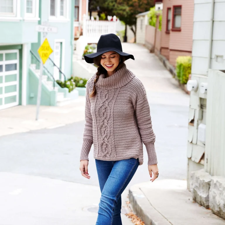 Step-by-step guide for creating a stylish cable crochet sweater pattern.