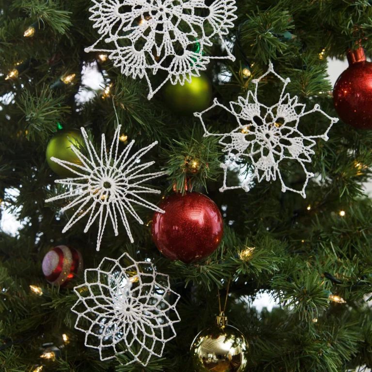 Flurry of Snowflakes crochet pattern featuring intricate snowflake designs