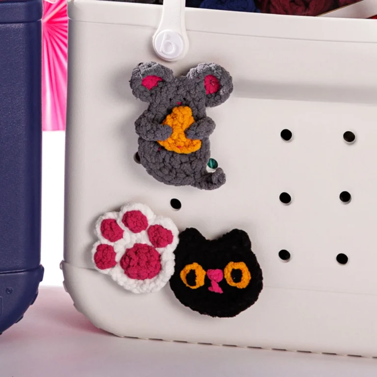 Adorable crochet bag charm featuring a cat design from the 'I'm Feline Fine' pattern.