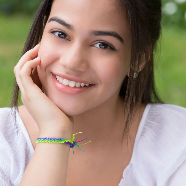 Three vibrant crochet friendship bracelets in various patterns and colors.