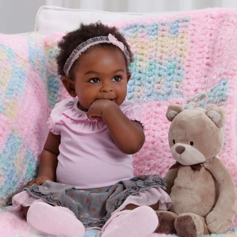 Colorful crochet blanket pattern showcasing vibrant color-block design.